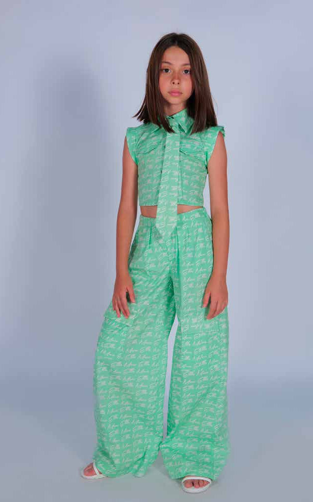 Pantalone in Cotone Fantasia Logo, Modello Gamba Larga con Tasconi Laterali Marc Ellis Junior bambina