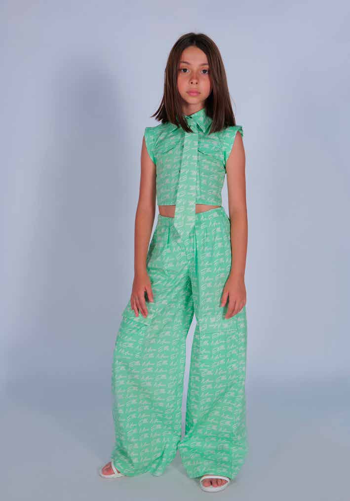Pantalone in Cotone Fantasia Logo, Modello Gamba Larga con Tasconi Laterali Marc Ellis Junior bambina