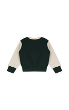 SVNST02274.GREENOFFWHITE.02.jpg